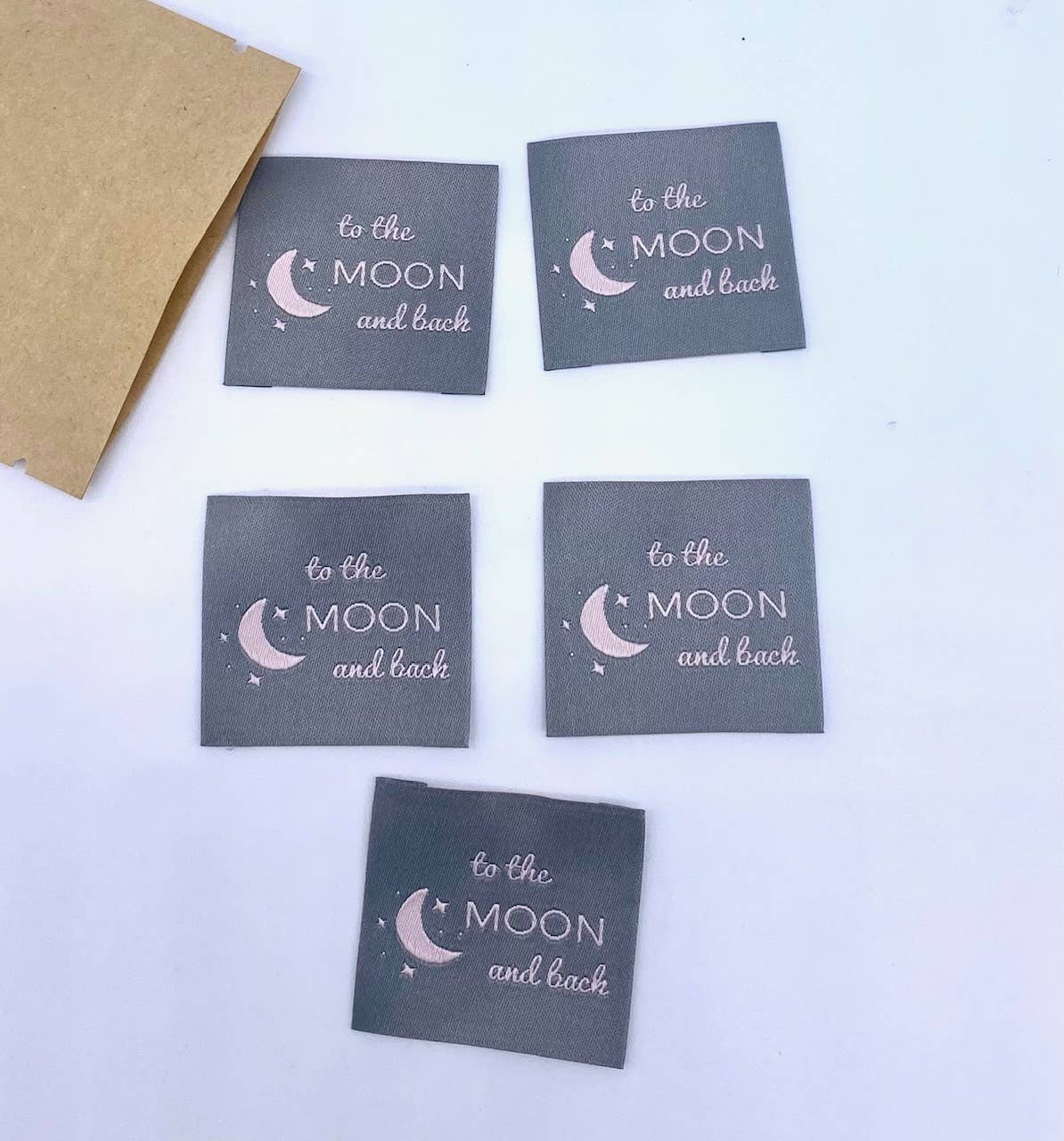 Label "TO THE MOON AND BACK"