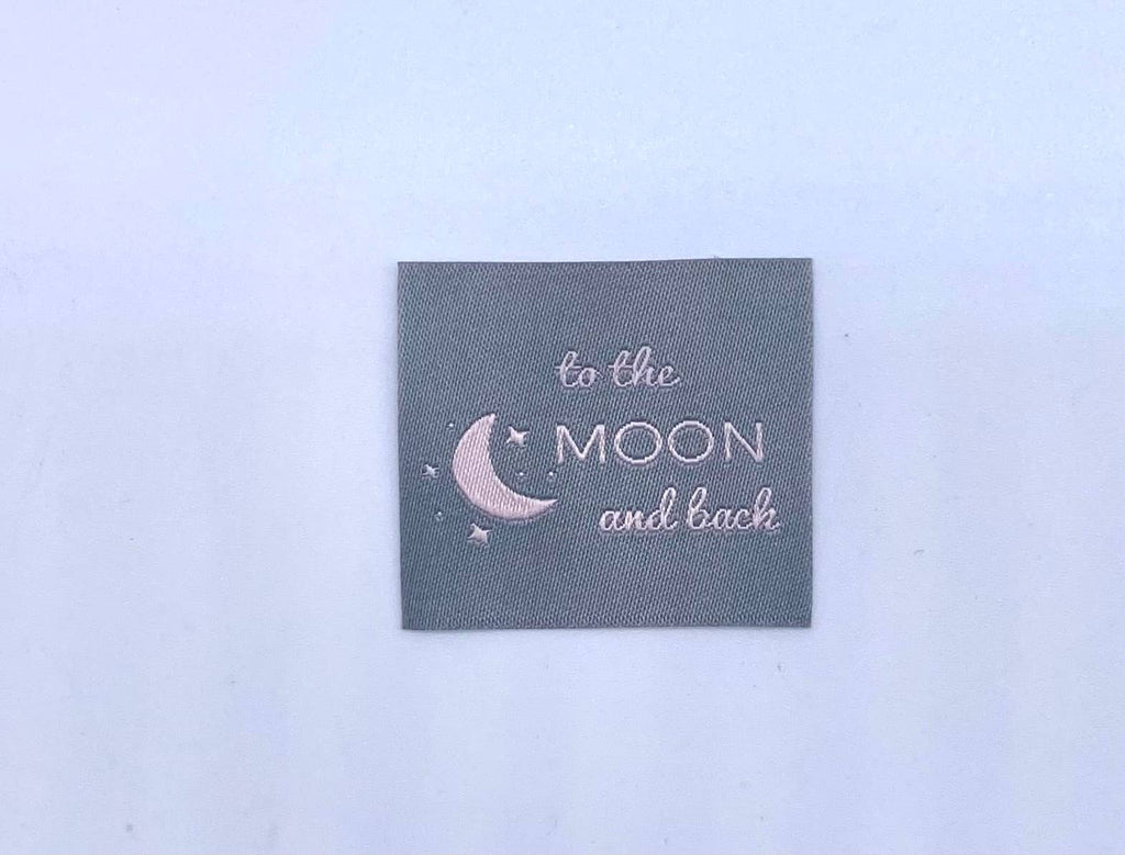 Label "TO THE MOON AND BACK"